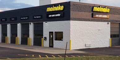 A wide shot of the front store of Meineke Car Care Cooler